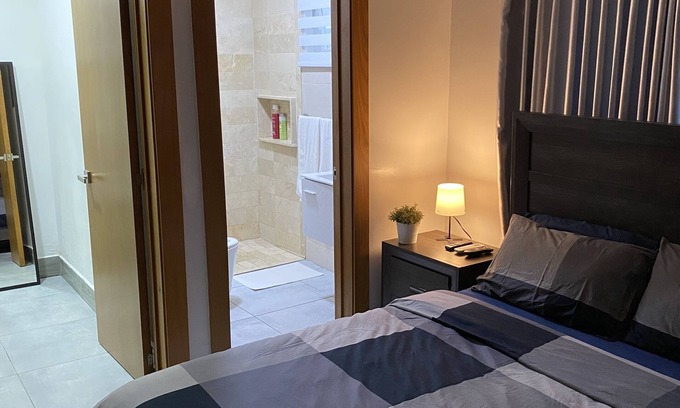 Ensanche Quisqueya Condominio | 1Br- LUX Location, Pool, Sauna, GYM -no need car for accommodation-