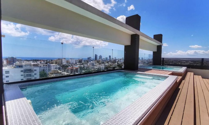 Santo Domingo Casa | 1br Luxury Condo Jacuzzi, gym Mountains with parking lot