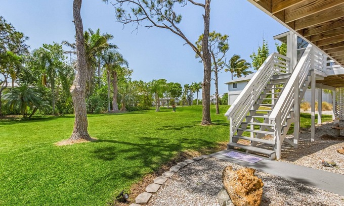 Pine Island Center Casa | 2/2 Heart of Pine Island Home, with Wrap Around Porch!