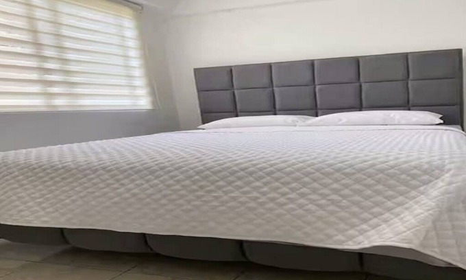 Santo Domingo de los Colorados Apartamento | 2-bedroom apartment in peaceful Santo Domingo with WiFi, AC