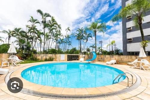 Aparecida Apartamento | 2 Dormitorios, Piscina Frente ao Mar