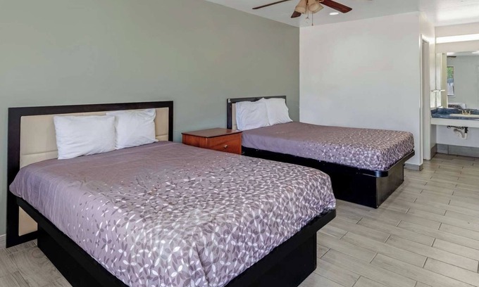 Eastside Promise Neighborhood Hotel | 2 Family-Friendly Rooms Near DT Entertainment Venues w/ Free Breakfast