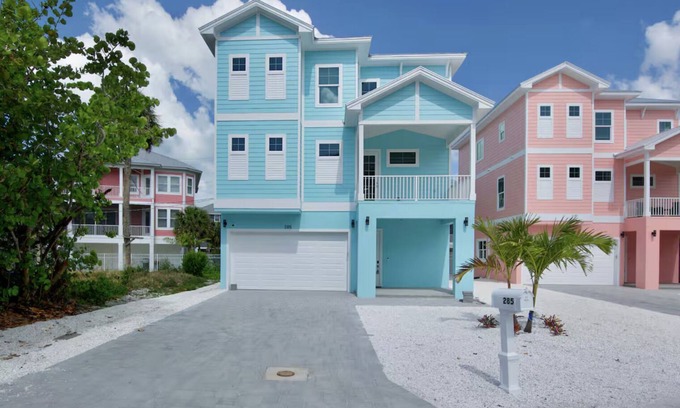 Fort Myers Beach Casa | 2 New Luxury Beach Homes Sleep 20+ Dual Pools & Spas Prime Location Steps to Times Square & Sand