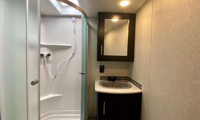 Medford Casa | 2 separate RV’s with queen-sized beds, dining area, and full kitchen.