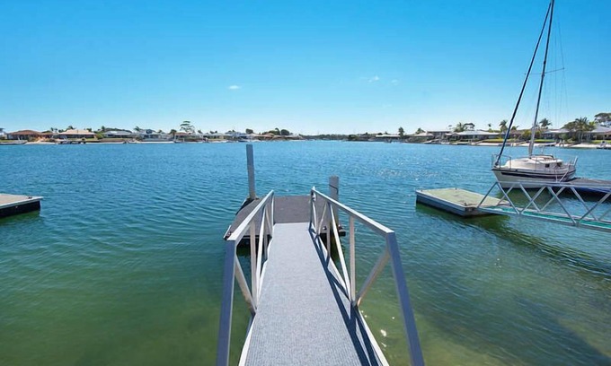 Yamba Casa | 21 MELALEUCA DRIVE, Waterfront with private boat ramp and pontoon -Pet Friendly