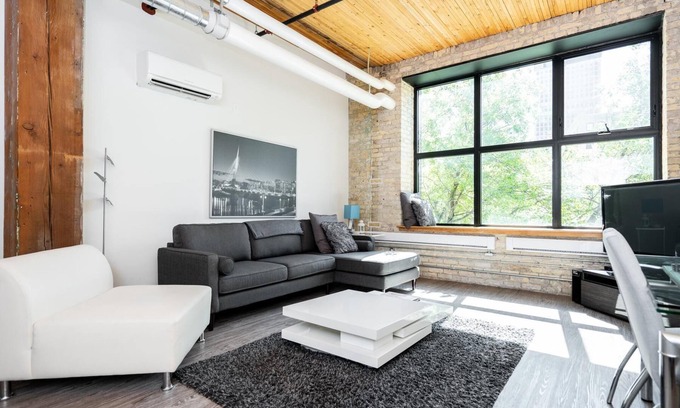 Exchange District Condominio | Loft de 2 dormitorios de carácter en el corazón de Winnipeg