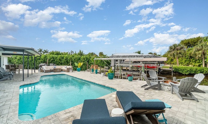 Iona Villa | Sailboat access. Under 15 min from Fort Myers Beach. Fire Pit and Heated Pool