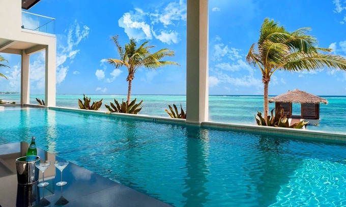 Bodden Town Villa | 25% Off! 7BR Oceanfront Villa w/ 5 Master Suites, Bunk Room, Swim-Up Bar