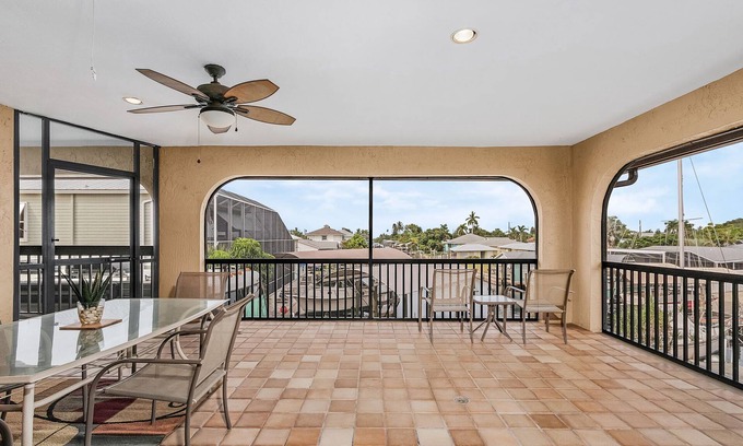Bokeelia Casa | 3/2 in Bokeelia with INCREDIBLE GULF ACCESS, BOAT SLIP INCLUDED! ​​​​​​​Spacious upstairs unit with amazing porch overlooking canal!