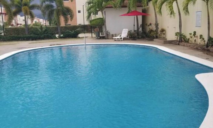 Gregorio Luperon Casa | 3 bedroom furnished apartment with pool gym parking 24 hours security