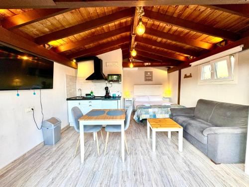 Puerto Marino Apartamento | 3 Casita-Estudio con Jardín en la playa