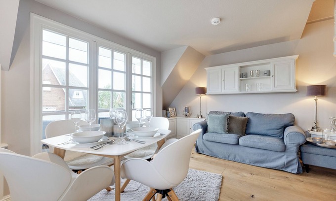 Munkmarsch Apartamento | 3-room apartment on the upper floor/ground floor with approx. 57 sqm floor space in Munkmarsch