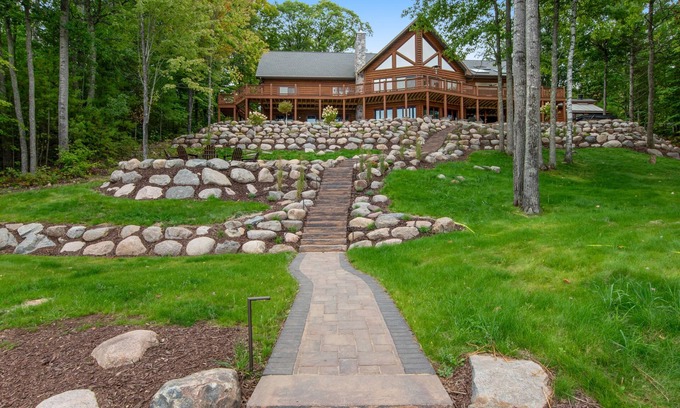 Lac du Flambeau Casa | 3-story chalet with private hot tub, game room & waters toys - dog-friendly