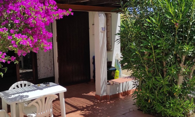 Villaggio Mandorli Casa | 350 mt from Campus, small bungalow with outdoor space surrounded by greenery.