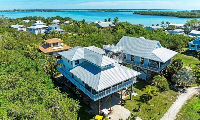 Placida Casa | 360* Views at "LGI Paradise" ~ Screened Porch w/ Hot Tub, Golf Cart included