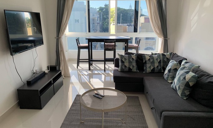 Santo Domingo Condominio | 4-bedroom condo Steps from Ocean w/Pier, parking, WiFi, AC, parks & shopping.