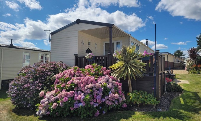 Aldborough Casa | 4 Berth Holiday Caravan con impresionantes vistas al mar 5 ☆ calificado con gran terraza exterior