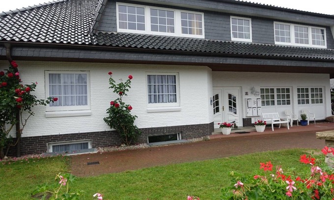 Ellenberg Apartamento | Apartamento de 4 estrellas con logia, chimenea y jardín para familias.