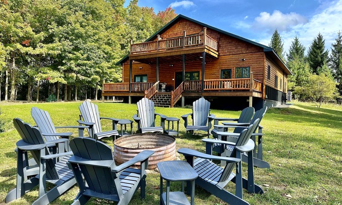 Central Lake Casa | 4bd/5ba Luxe Log Cabin - Sunset View of Torch Lake, Hiking Trails, Premier Golf