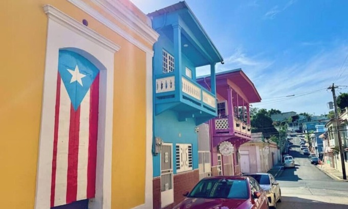 Mayaguez Pueblo Apartamento | 5.9 Purple Casita w/ historic balcony