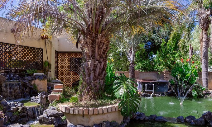 Greenfields Casa | 5 Bedroom home with an amazing back yard including a pool and large Koi ponds