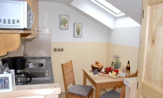 Grassau Apartamento | quinto Apartamento Kampenwand, 28 m², 1-2 pers., Salón-dormitorio, balcón orientado al oeste 2. OG