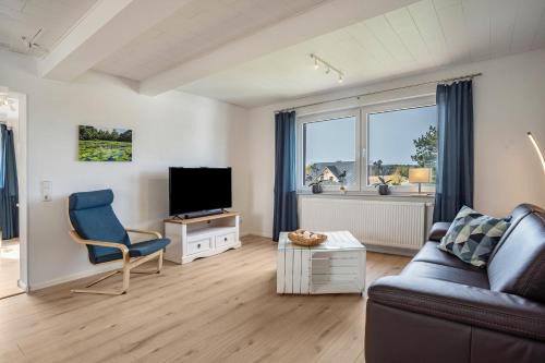 Glowe Apartamento | 5 Sterne Ferienwohnung Boddenblick