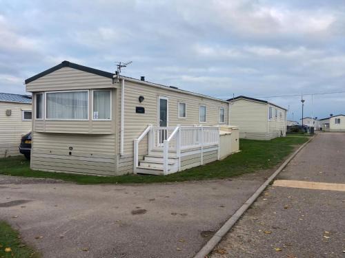 Felixstowe Otro | 6 Berth Caravan With Side Decking At Suffolk Sands Holiday Park Ref 45054C
