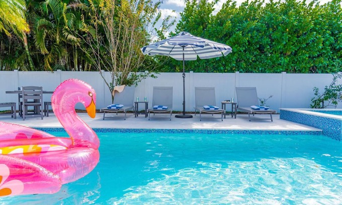 Naples Park Casa | 690 Paradise Shores Oasis | New Heated Pool & Spa