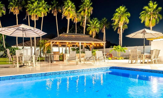 Palma Sola Casa | 75 Palms! 8 Bedroom Home by RedAwning