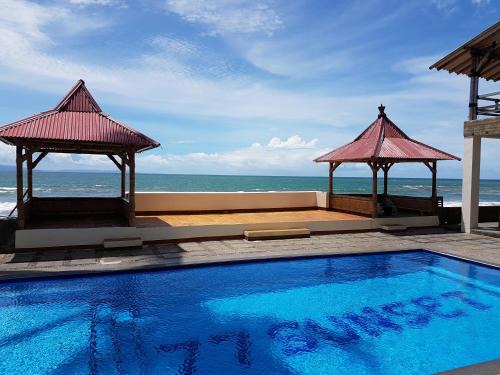 Cikakak Complejo | 77 Sunset Plaza