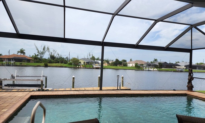 South Gulf Cove Casa | A 100+ reviews Family friendly home on canal with gulf access and heated pool!