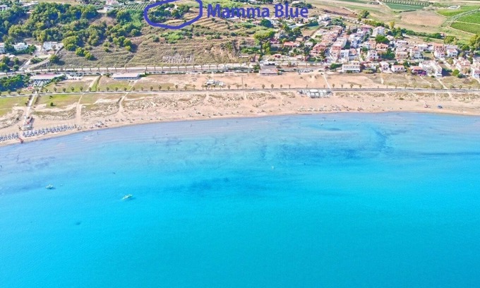 Porto Palo Villa | A balcony on the beach, swimming pool, lush parkland