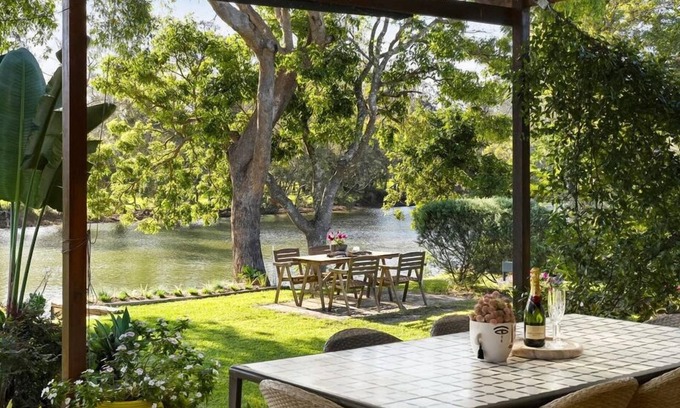 Urunga Casa | Encantadora y confortable casa familiar frente al río en la encantadora Urunga, cerca de Bellingen