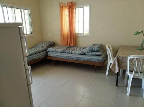 Merhav Am Casa | A Place to Lay Your Head - Gila Orlan
