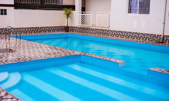Bukoto Apartamento | A quiet one bedroom set with small gym and swimming pool.