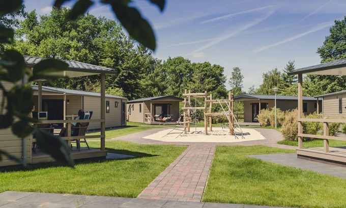 Zuna Cabina | A spacious bungalow with a nice veranda and a view of the playground