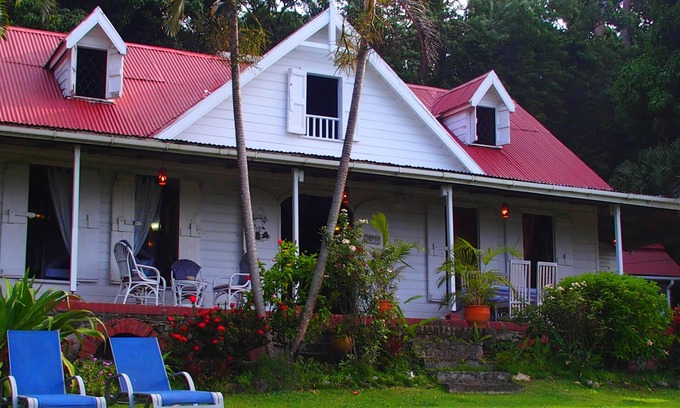 Charlotte Villa | Plantation House, con magníficas vistas panorámicas al océano, 4x4 disponibles para alquilar.