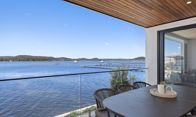 Point Clare Casa | A Waterfront at Point Clare - Waterfront at Point Clare is the dream holiday house - absolute waterfront, private jetty, heated pool and stunning views from every level.