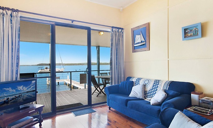 Sunshine Casa | Frente de agua absoluta con embarcadero privado !! Sunshine Cottage en el lago Macquarie