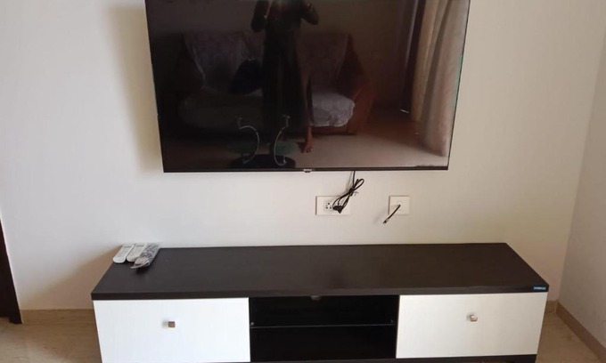 Kadadhe Apartamento | AC 1bhk furnished flat towards highway view in Lodha Belmondo, Pune