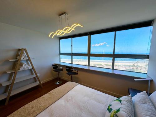North Beach Apartamento | Accommodation Front - Majestic Beachfront Haven