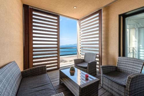 Molini Apartamento | Agosta Bella - Appt en face de la plage dAgosta