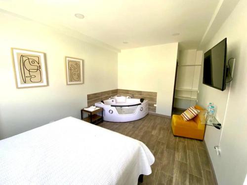 Baños de Agua Santa Apartamento | AHAVAH SUITES