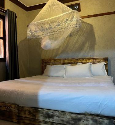 Central Kampala Cama Y Desayuno | Albertine Vacations Cottages