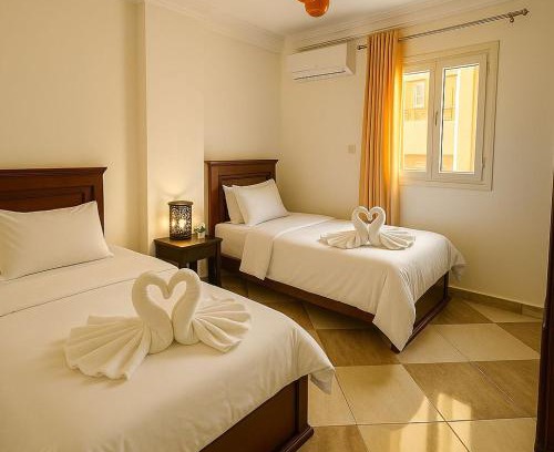 Ar-Raml 2 Apartamento | Alex 2BR - Smart TV - Wi-Fi - Work Desks & Bicycle