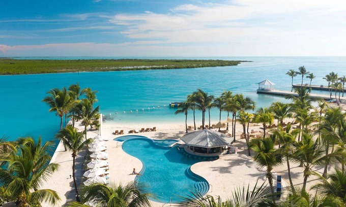 Leeward Settlement Complejo | All-Inclusive Escape! Three Oceanfront 1BR, Private Beach, Paddleboarding
