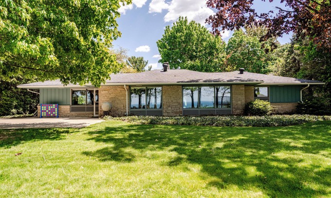 Riverside Casa | All The Waters Retro Home on Lake Michigan- PRIVATE BEACH-Large, shaded backyard