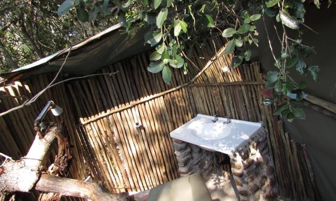 Thorny Bush Game Reserve Alquiler De RV | Amanzimlotzi Riverside Bush Tent for 3 Adults in Limpopo, Kruger Park