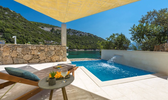 Podimoc Casa | Increíble casa familiar frente al mar con piscina privada y playa